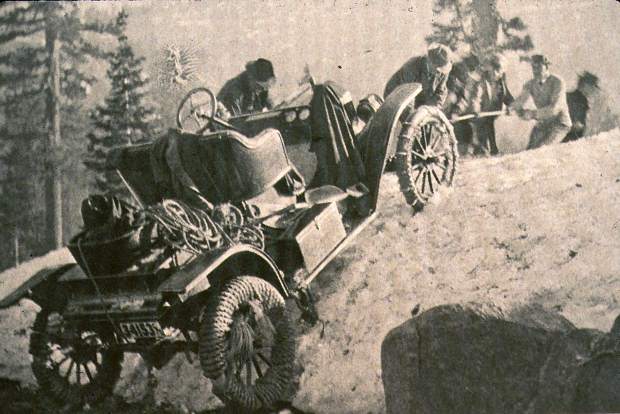 Courtesy Searls Historical Library Men from Grass Valley push, pull, and drag a Model T automobile over Sierra drifts in June 1911. Rope is wrapped around the tires for traction.