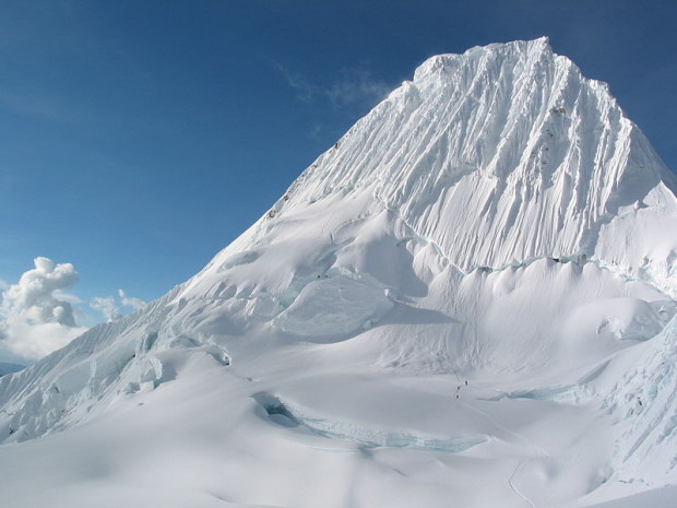Alpamayo with climbers for scale 