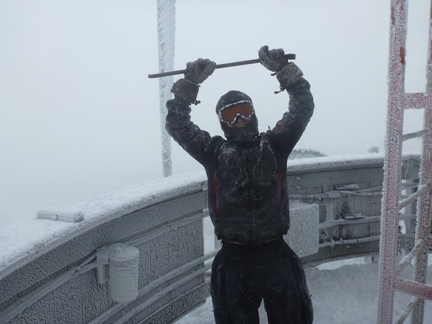 Summit intern Tom Padham dusts off the trusty crowbar for some rime ice removal earlier today in his (rime-encrusted) EMS Fader Jacket! - Mt. Washington Observatory