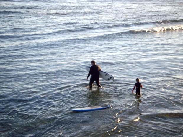 Ian and his father heading out for some waves