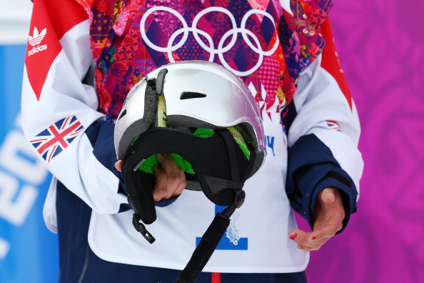 Jenny Jones of Great Britain holds the cracked helmet of Sarka Pancochova of Czech Republic after Pancochova fell in the Women's Snowboard Slopestyle Finals during day two of the Sochi 2014 Winter Olympics at Rosa Khutor Extreme Park on February 9, 2014 in Sochi, Russia.  (Photo by Cameron Spencer/Getty Images)