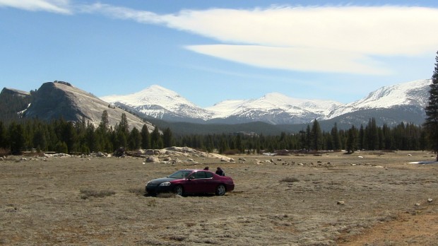 Car in the middle of Tuolumne Meadows, Yosemite National Park.  May 9th, 2014