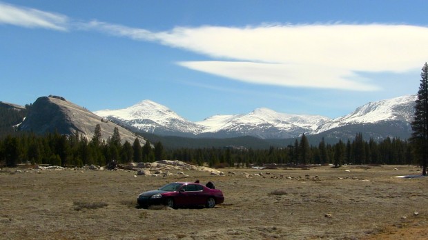 Car in the middle of Tuolumne Meadows, Yosemite National Park.  May 9th, 2014