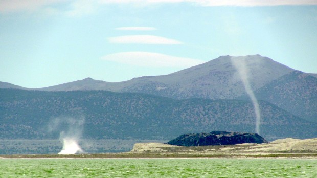 Water spouts on Mono Lake today.  On forming and one skyrocketing