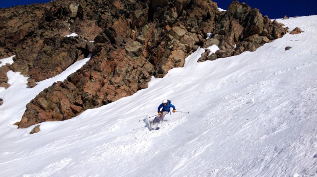 Aaron cranking down the Nubes chute in the pow/spring conditions.