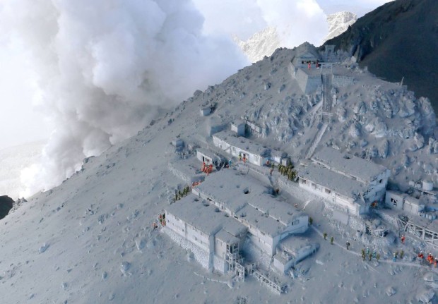 Mountain lodge buried in ash after eruption on Mt. Ontake. photo: kimmasa mayama/epa
