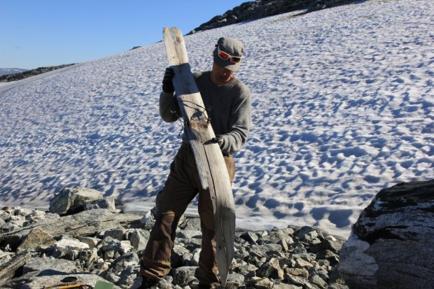 One of the archaeologists on the team from Oppland County, Runar Hole, displays the 1,300-year-old ski found last summer. PHOTO: Oppland County