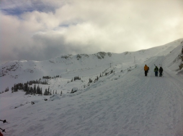 Hiking up towards Harmony to get some turns