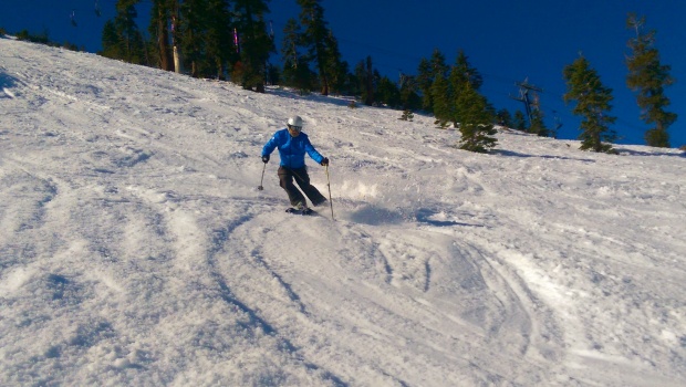Skimac pushing around some snow