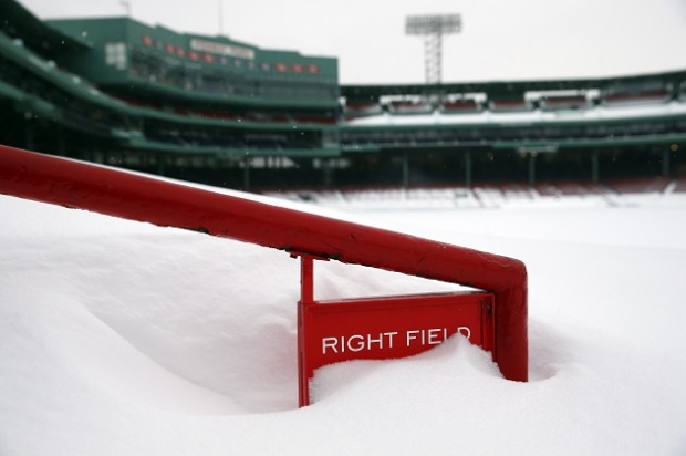 BOSTON - FEBRUARY 9: The Right Field seats are covered in snow at Fenway Park in Boston, Mass. on Feb. 9, 2015, as yet another winter storm brings mounting accumulation. (Photo by Jessica Rinaldi/The Boston Globe via Getty Images)