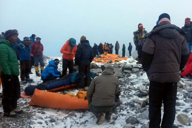Injured climbers and Sherpa being airlifted from basecamp yesterday.  photo:  afp