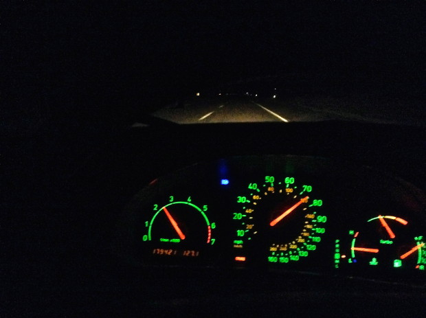 Focus on the road at night.