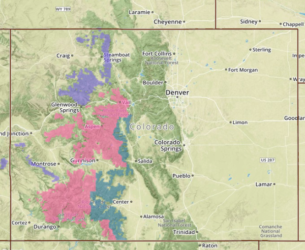 Pink = Winter Storm Warning.  Blue = Winter Storm Watch.  Purple = Winter Weather Advisory.