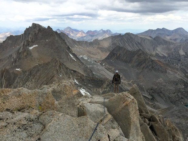 Racing the thunderheads on Bear Creek Spire. We summitted but the sky won this time.