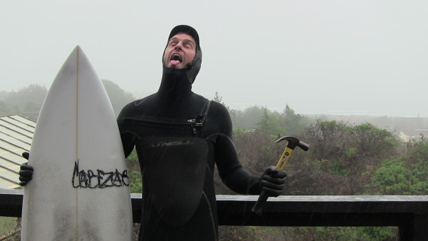 The author going surfing in the rain at Lobos.  Cold, wet, terrible winter waves on a stormy day.