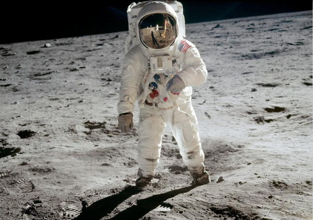 Astronaut Buzz Aldrin, lunar module pilot, walks on the surface of the Moon near the leg of the Lunar Module (LM) "Eagle" during the Apollo 11 extravehicular activity on July 20, 1969. Astronaut Neil A. Armstrong, commander, took this photograph with a 70mm lunar surface camera. While astronauts Armstrong and Aldrin explored the Sea of Tranquility region of the Moon and astronaut Michael Collins, command module pilot, remained with the Command and Service Modules (CSM) "Columbia" in lunar orbit. #