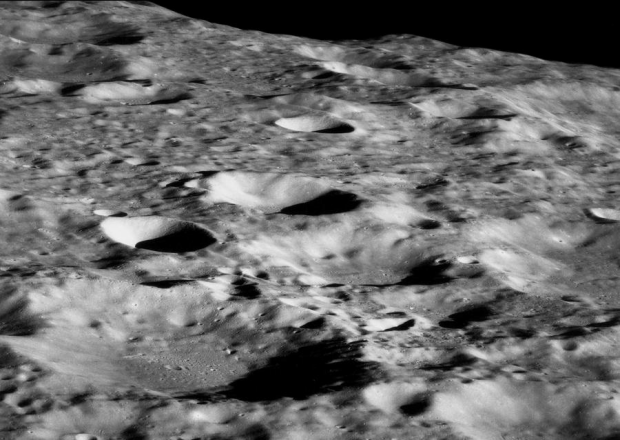 eaching lunar orbit, a view of the surface west of Daedalus Crater. #