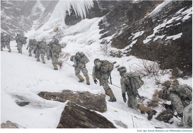 Soldiers attending the US Army Mountain Warfare School in Jericho, Vermont, climb Smugglers' Notch as part of their final phase of the Basic Military Mountaineering Course, February 19, 2015.