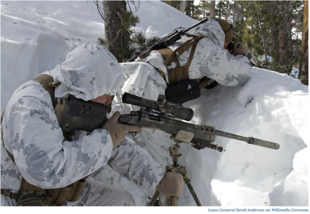 A shooter and his spotter prepare a shot during the Mountain Scout Sniper Course at Marine Corps Mountain Warfare Training Center, Bridgeport, California.
