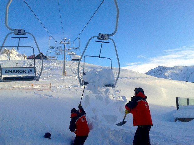 Yeah, it snowed a lot at Las Lenas, Argentina.  Lifties clearing off deep snow on chairlifts today.