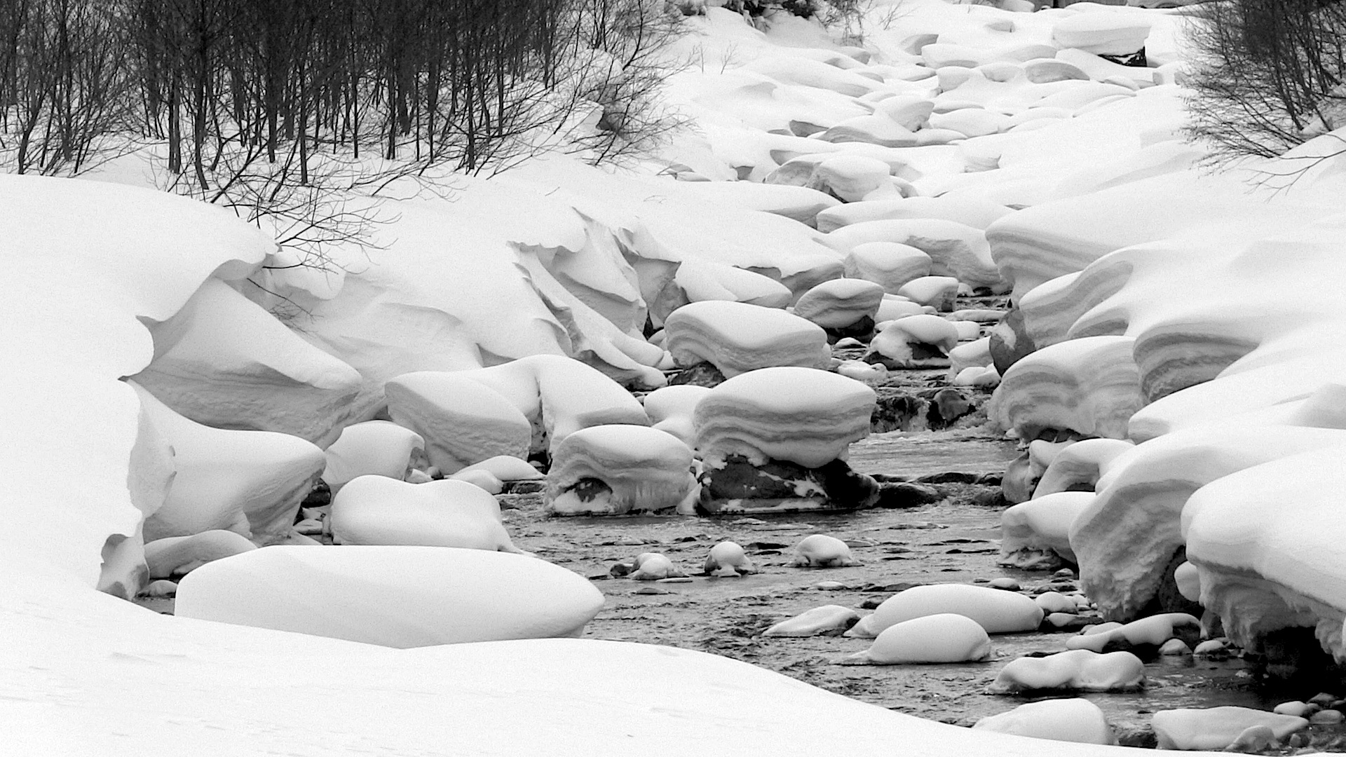 Japanese creek covered in deep snow. photo: miles clark/snowbrains