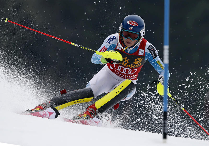 Mikaela Shiffrin, of the United States, speeds down the course during the second run of an alpine ski, women's World Cup slalom race, at the World Cup finals in Meribel, France, Saturday, March 21, 2015. (AP Photo/Shinichiro Tanaka)