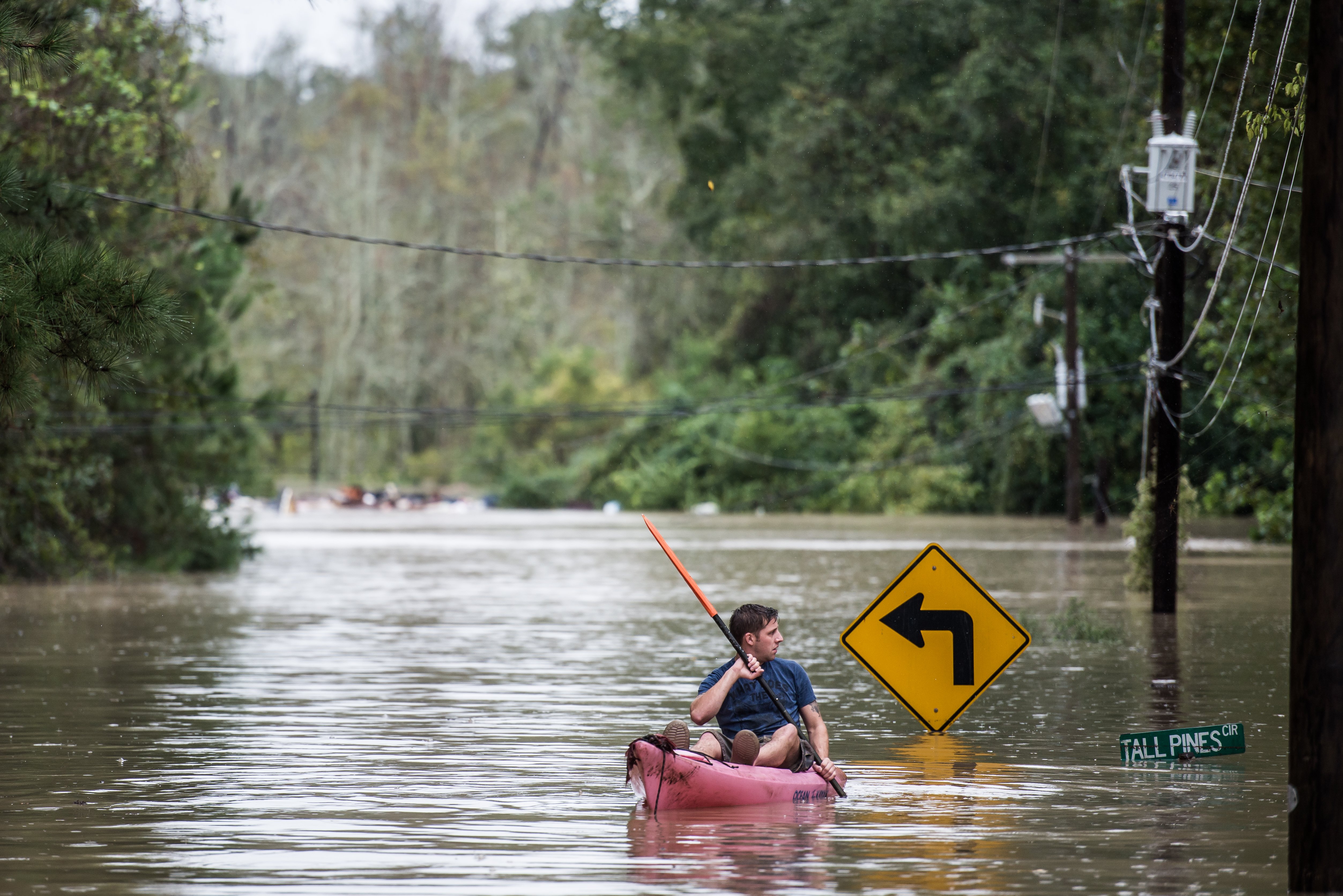 A man kayaking on Tall Pines Circle in Columbia, South Carolina on October 4, 2015. photo: paul fayfield/getty images