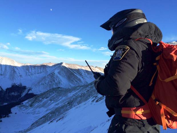 Rescuer coordinating patient extraction on Saturday near Bald Mt. in Summit County, CO. photo: SC