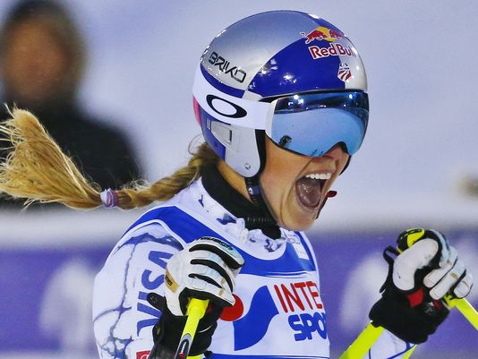 Lindsey Vonn celebrating after the win today. AP Photo/Giovanni Auletta