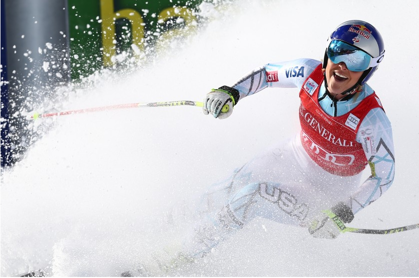 Lindsey Vonn smiles big after doing the spllits, recovering, and winning the Lake Louise downhill today.  photo:  getty