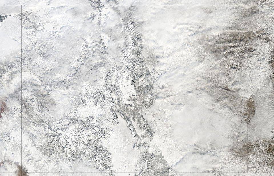 CO looking completely snow covered from space on January 9th. photo: nasa