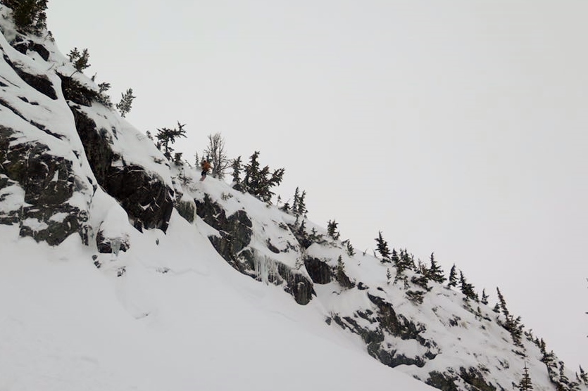 Can you find the snowboarder sending the Harmony wall?
