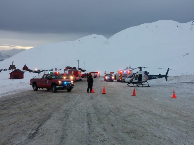  Emergency vehicles are gathered in the parking lot near Summit Lake in Hatcher Pass after an avalanche on Saturday, Jan. 16, 2016. Courtesy Todd Zumbehl 