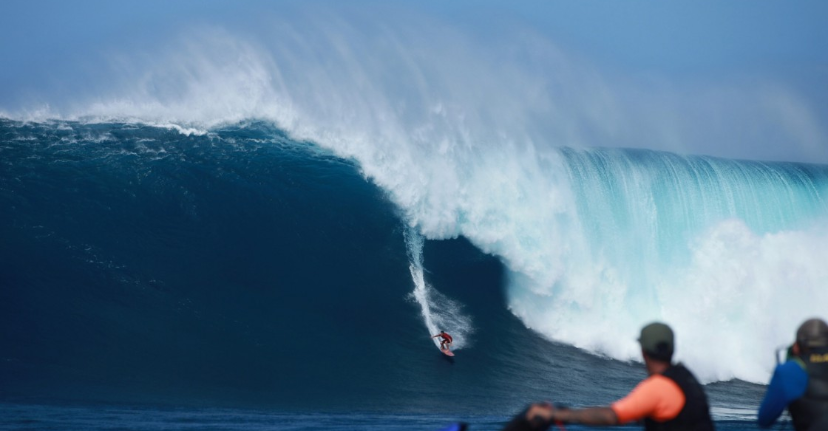 Aaron Gold and the biggest wave ever paddled into.  photo:  Brent Bielmann/Surfer Mag