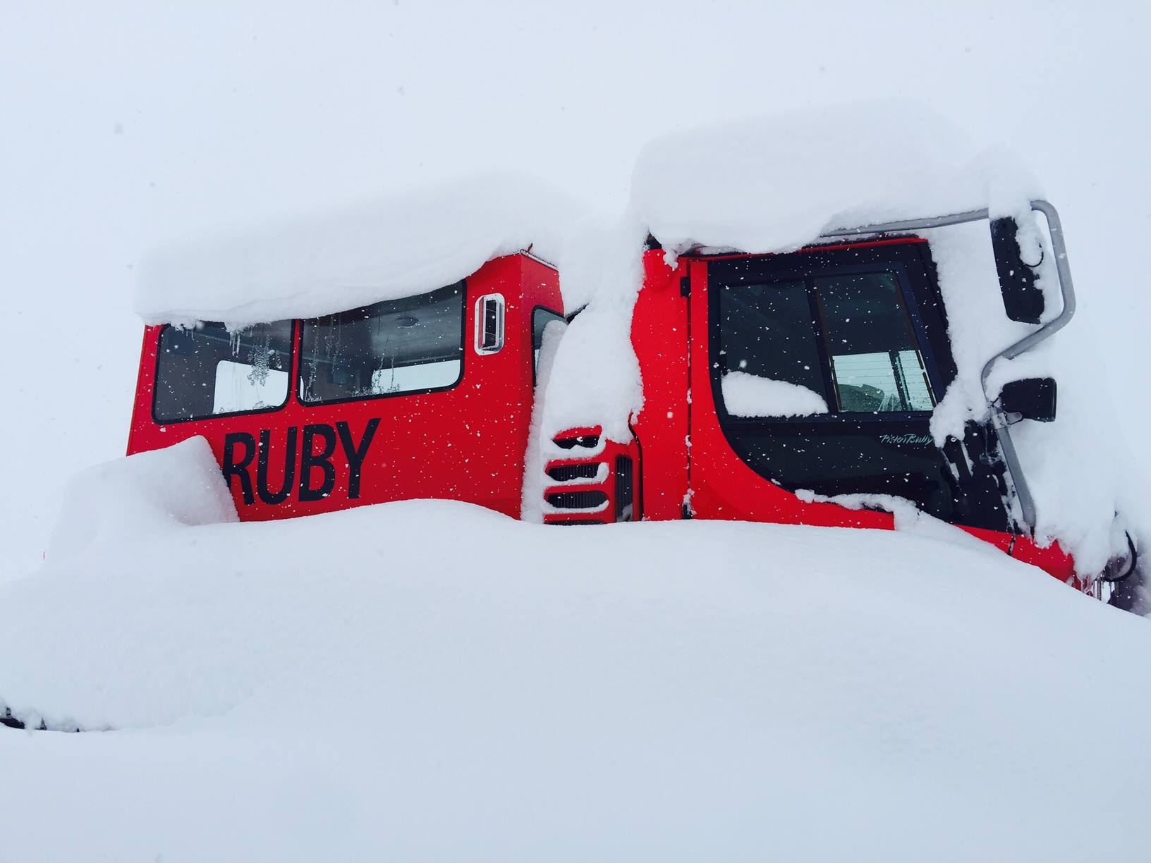 Snowcat buried in snow at Ruby Mountain Heli on March 29th. photo: ruby mountain heli experience