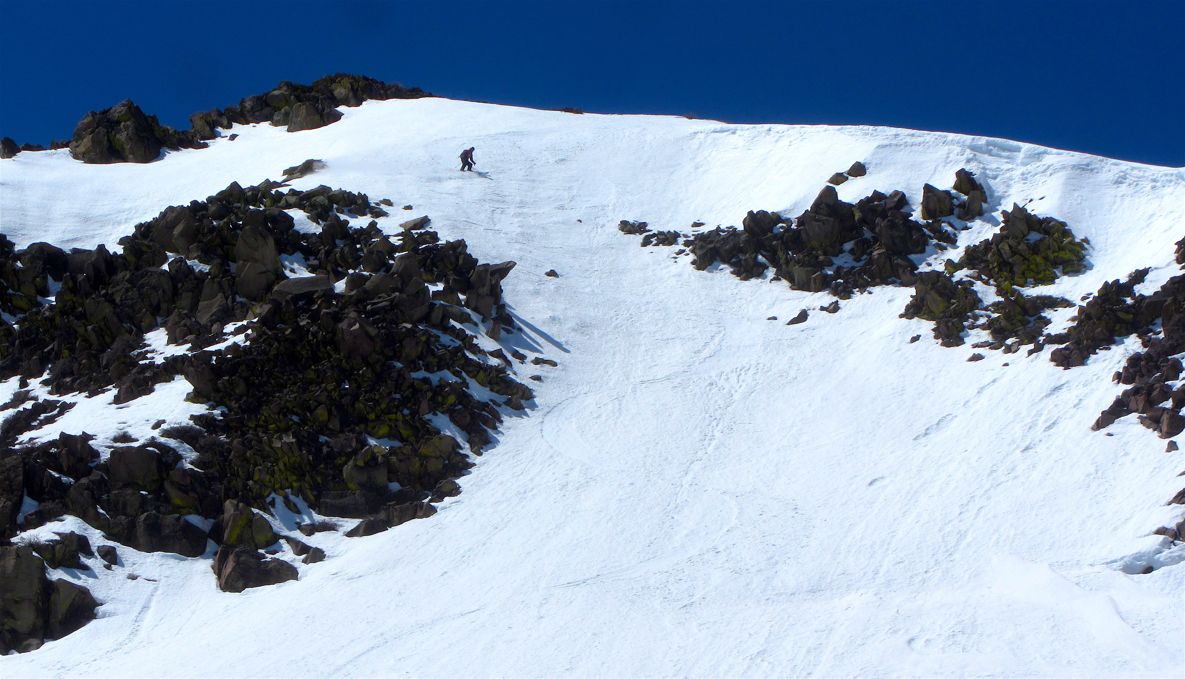 Rick dropping into the Comma Couloir today. photo: miles clark/snowbrains