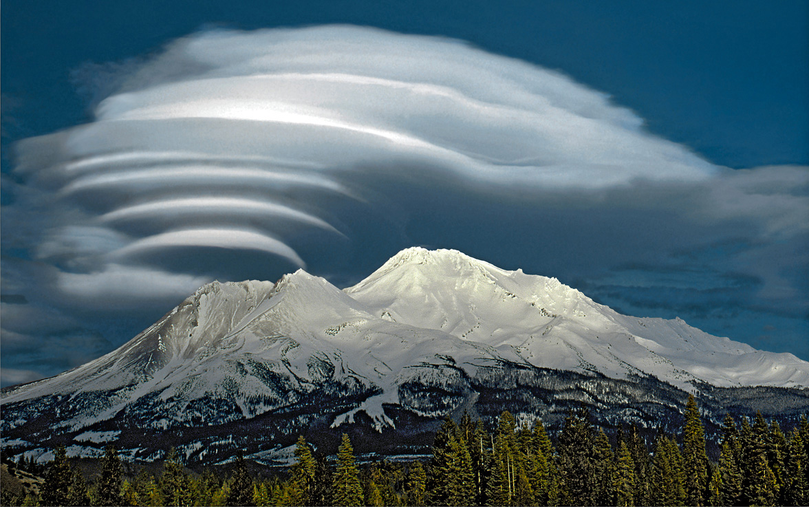 Stock image of Mt. Shasta and lenticular clouds.