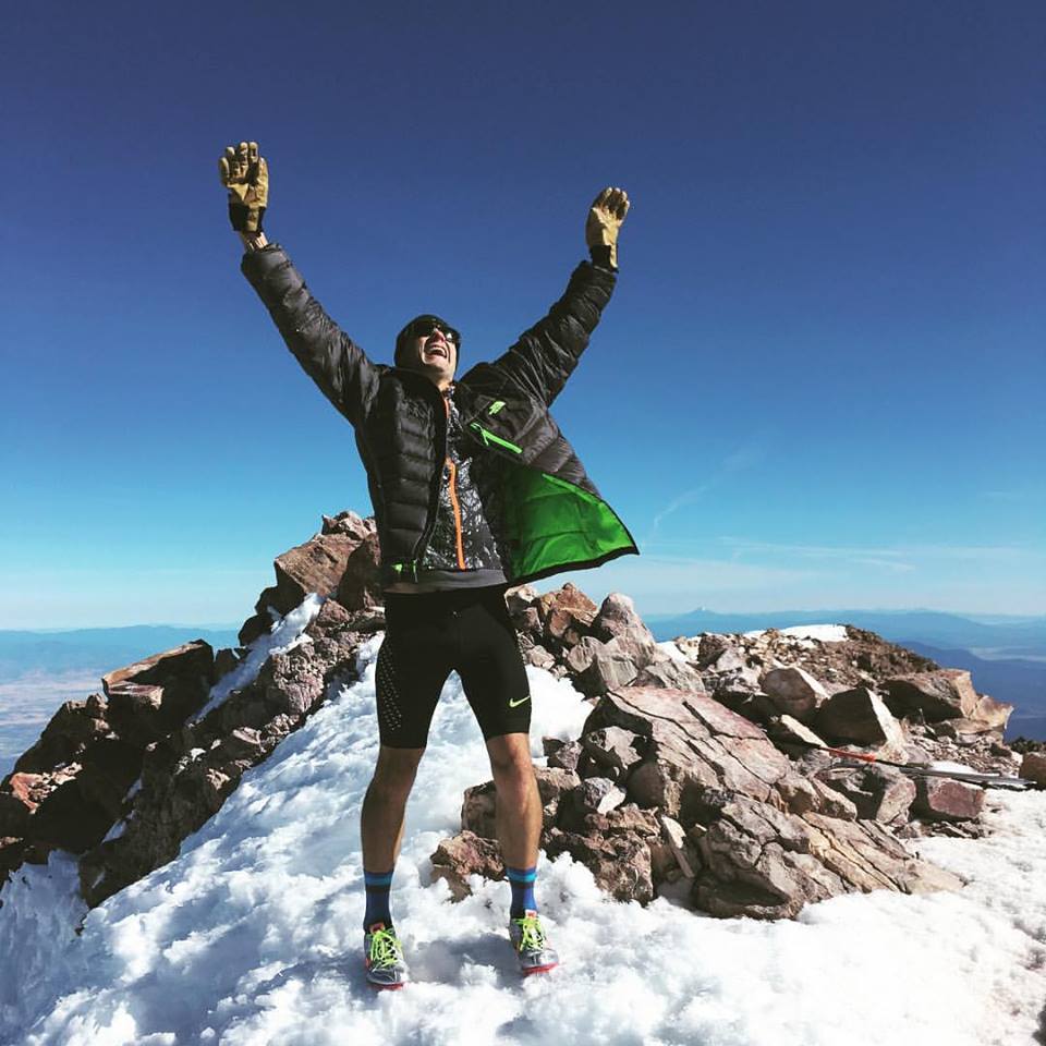 Ryan Ghelfi on the summit of Shasta after his record breaking ascent.