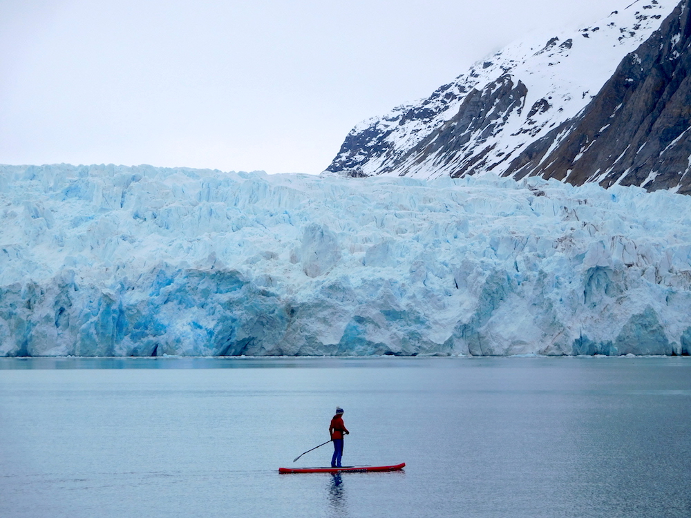 Liz looking comfy on the SUP. photo: snowbrains