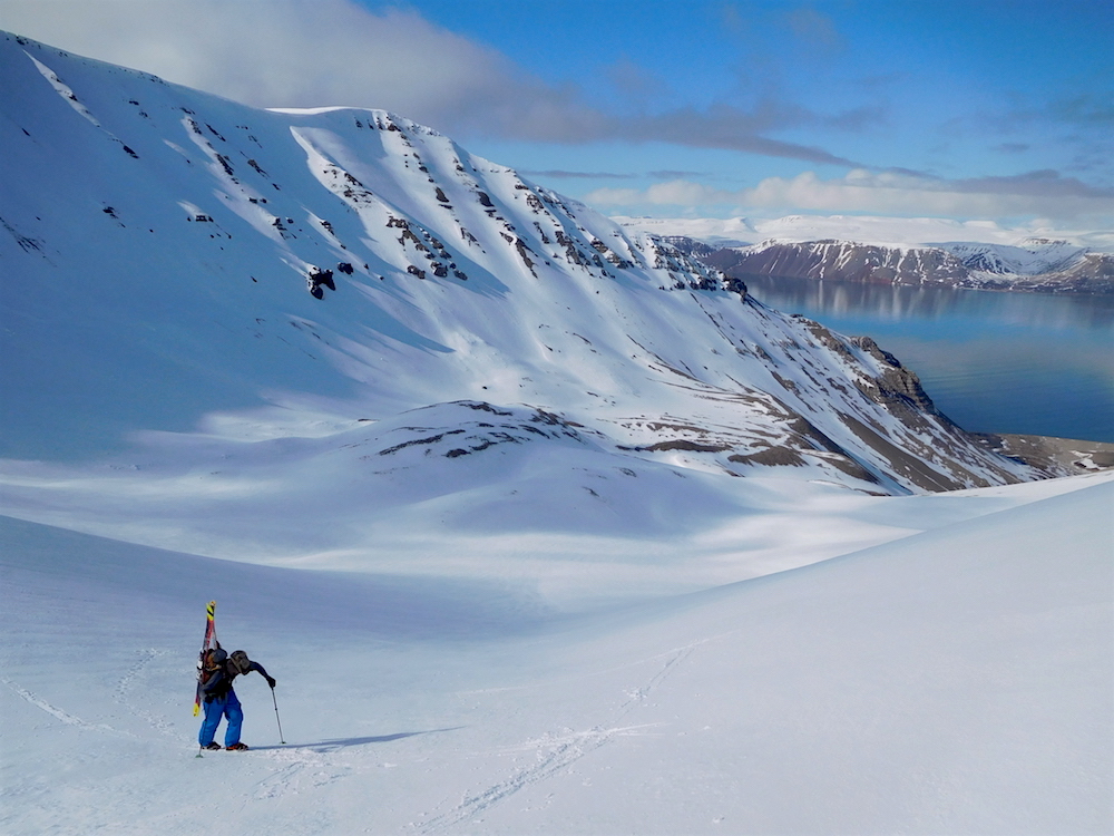 Gary booting up to the goods above an unreal view. photo: snowbrains
