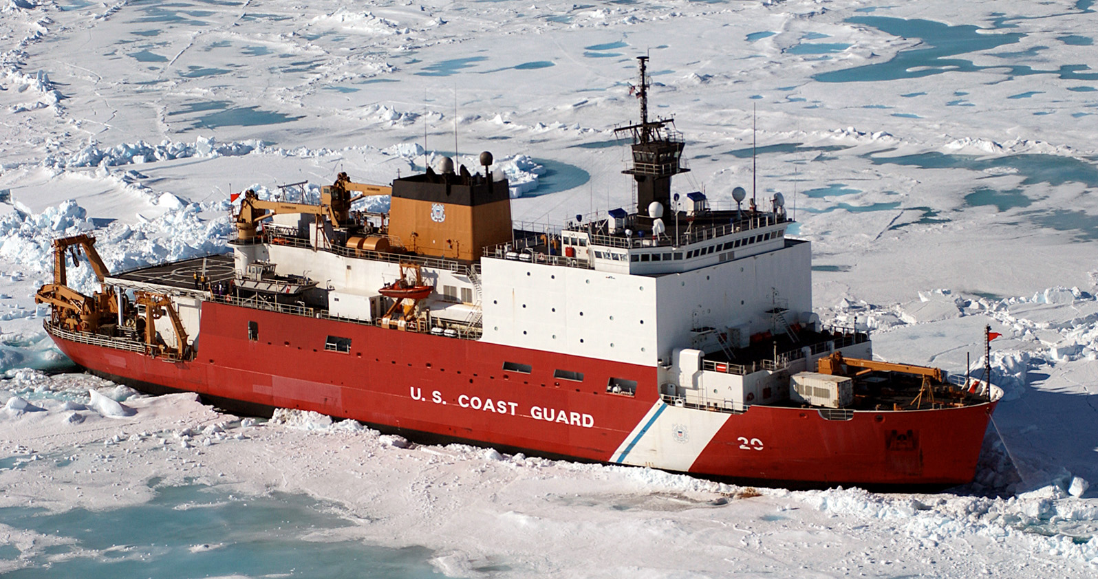 The U.S. Coast Guard Healy Class Icebreaker HEALY (WAGB 20) sits in the ice, about 100 miles north of Barrow, Alaska, in order to allow scientists onboard to take core samples from the floor of the Arctic Ocean on June 18, 2005. (U.S. Coast Guard photo by Public Affairs Specialist 2nd Class NyxoLyno Cangemi) (Released)