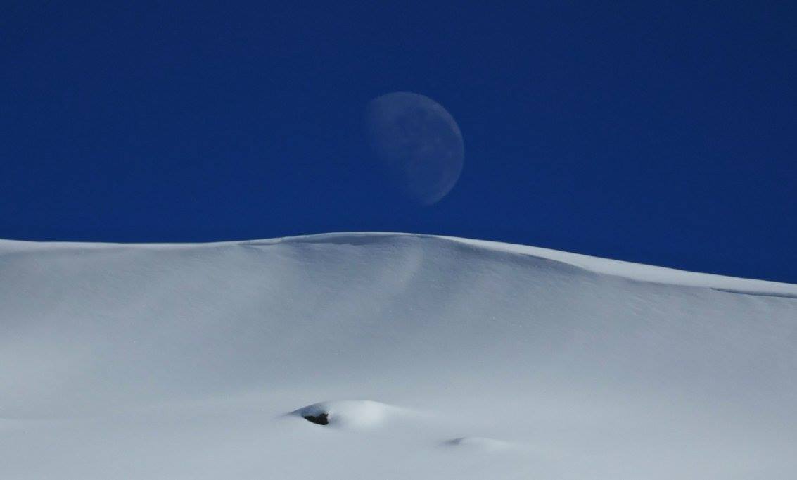 Mt. McKay and the waning moon on August 21st, 2016.  photo:  skiing with steve lee
