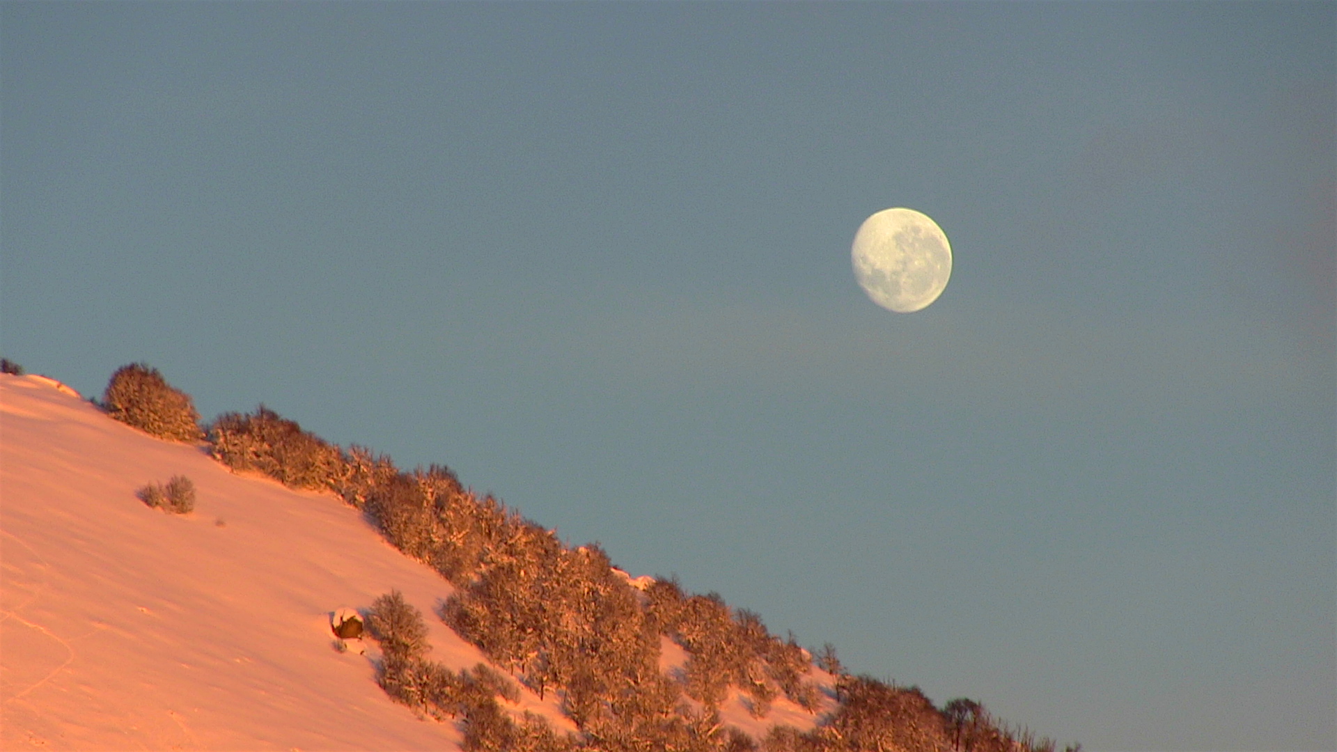 Moonset and Cerro Catedral in Bariloche on August 21st, 2016. photo: snowbrains