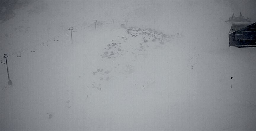 The storm is already hitting right now (9am local time) with high winds and snow. image: webcam 