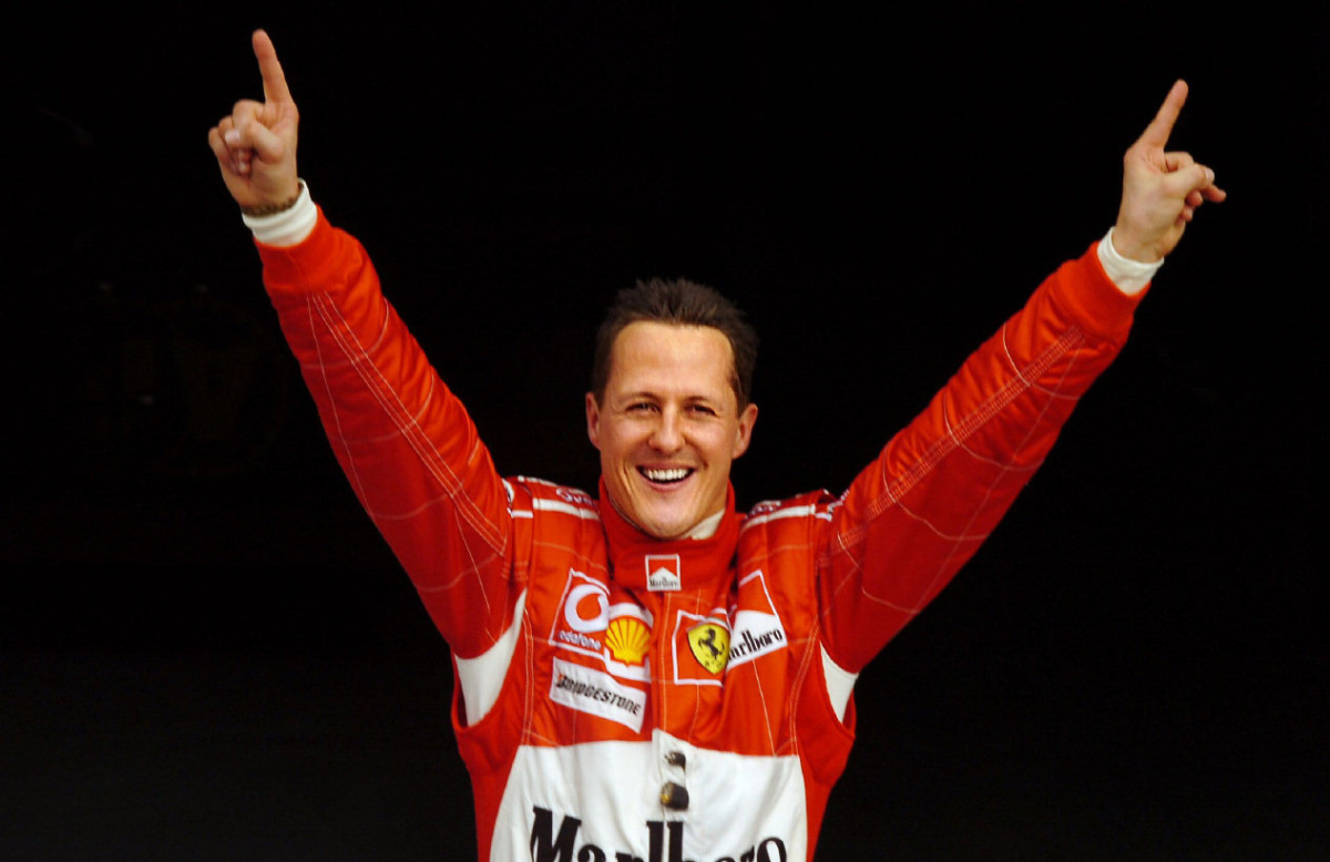 Michael Schumacher after a win in 2006. AFP PHOTO DAMIEN MEYER (Photo credit should read DAMIEN MEYER/AFP/Getty Images)