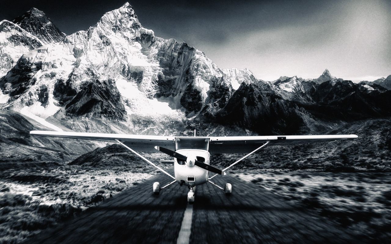 A small plane taking off in the mountains.    PC: WPaperHD