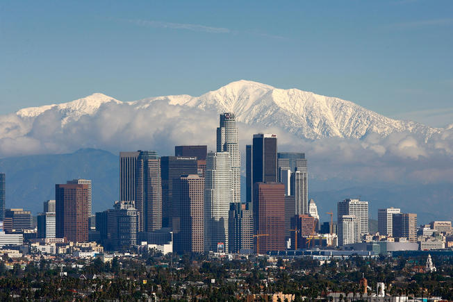 Los Angeles in the foreground, with the San Gabriel mountains gleaming after a winter storm.