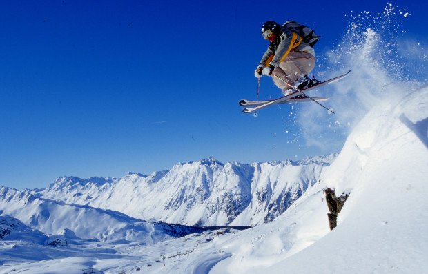 Skier hitting a jump