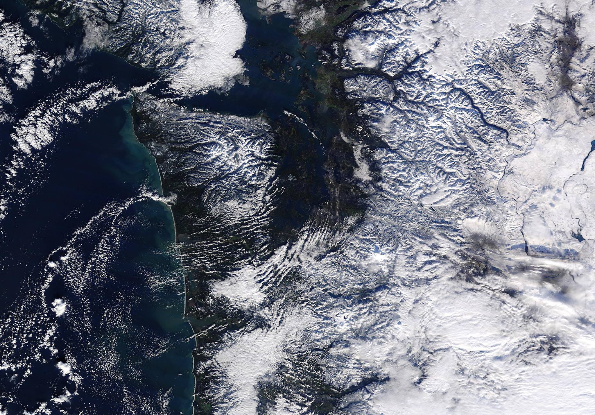 Washington buried in snow yesterday from space. image: nasa, yesterday