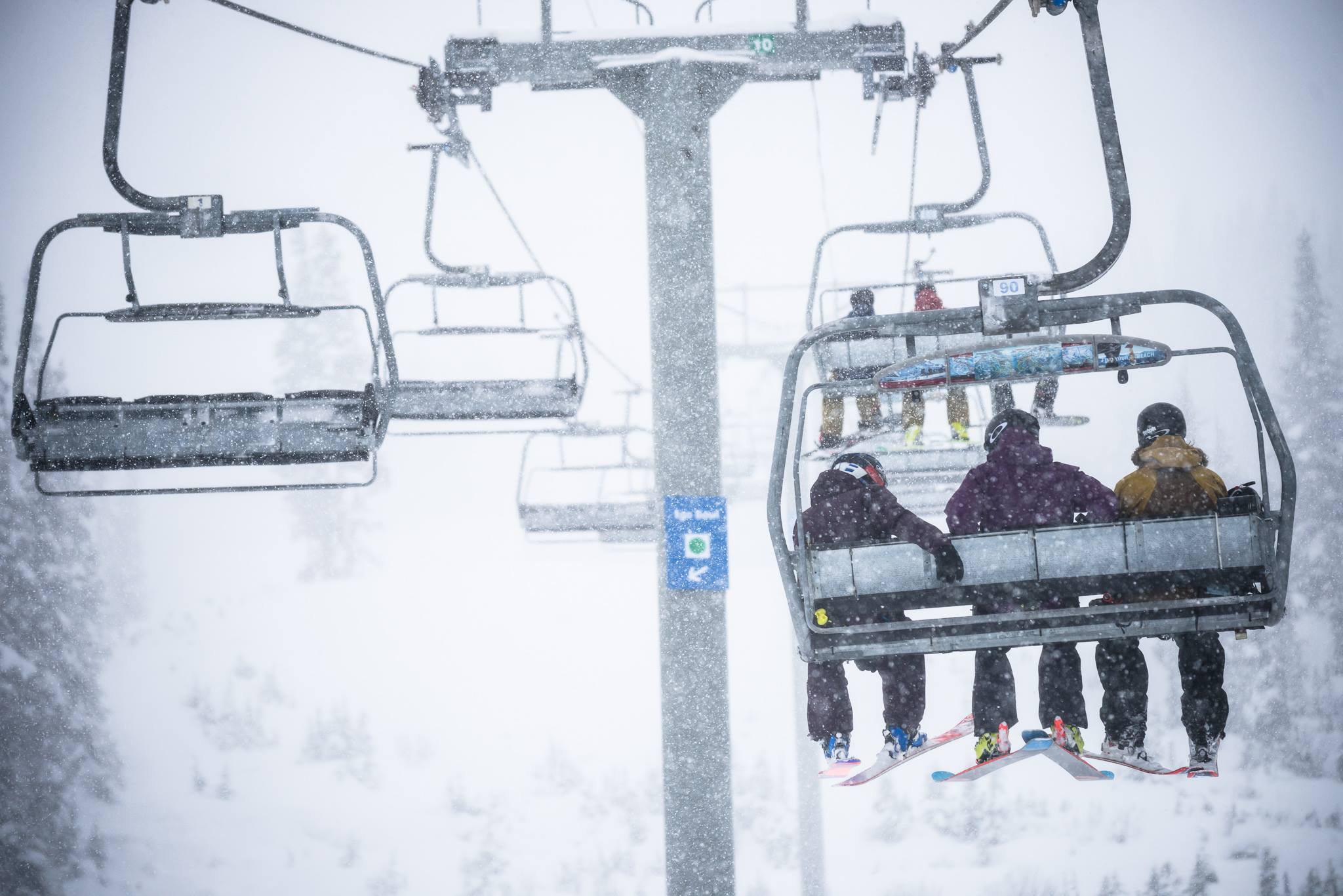 There are friends on a POWDER Day.. at least on the chairlift! PC: Andrew Strain